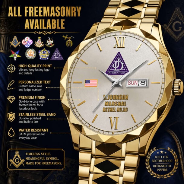 Luxury gold Freemasonry watch with logo, date, and day display.