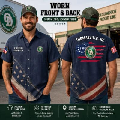Men wearing navy linen shirts with US flag and company logo at freight yard.